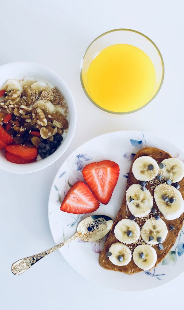 flatlay photography of bread and fruits